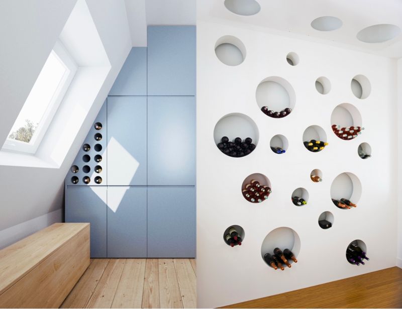 Minimál bortárolási ötlet falba kialakított kör alakú polcokkal