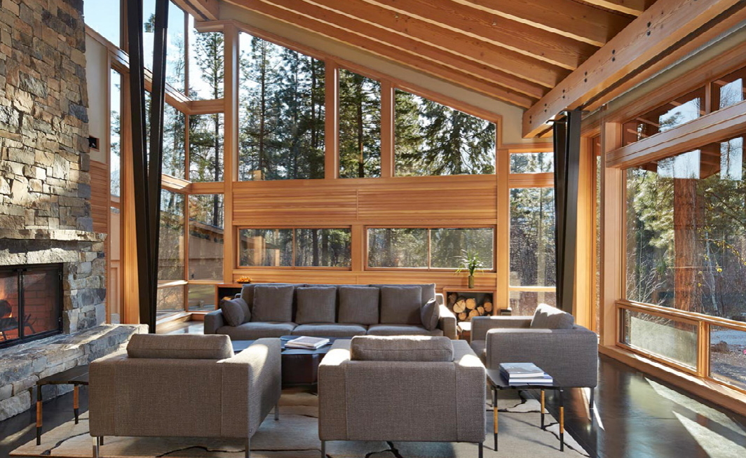 Kanadai faház nappalija szürke ülőgarnitúrával