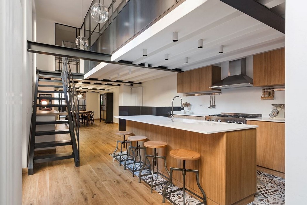 Modern konyha cementlapokkal egy loft lakásban