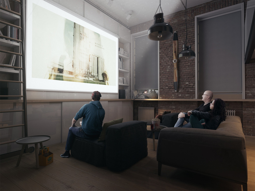 Közös filmnézés projektorral a nappaliban