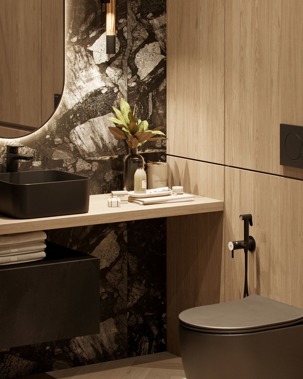 Fekete szaniterek a luxus színvonalú fürdőszobában