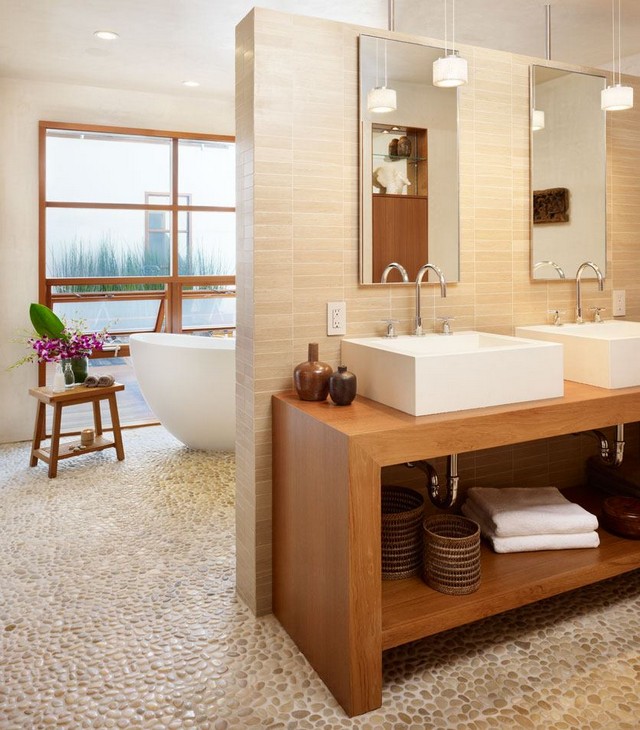 Kavicsburkolat padló mosdópult szögletes mosdó bézs falburkolat