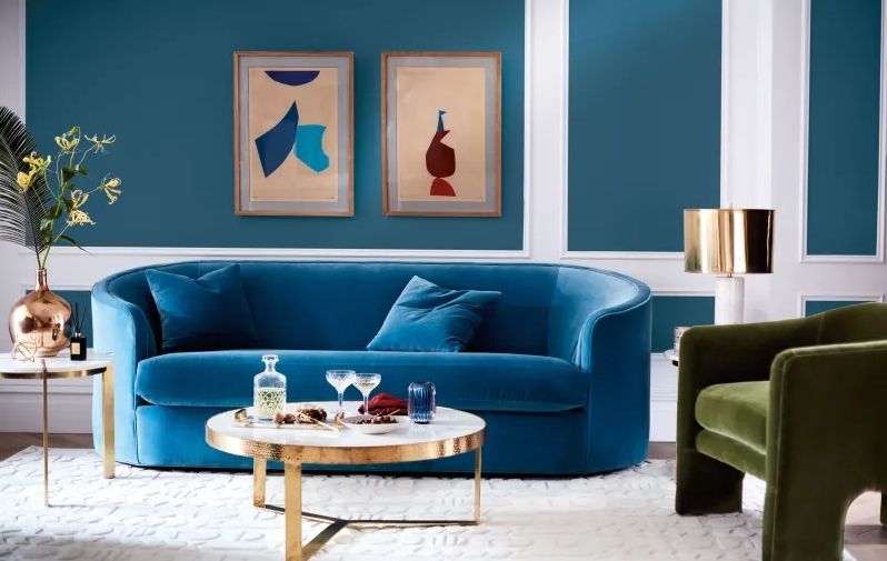 Kék íves bársony kanapé