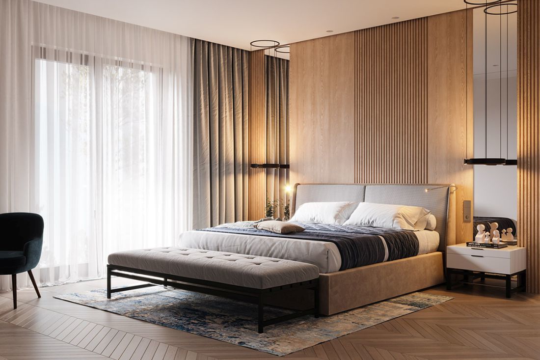 Modern hálószoba, az ágy végében egy ottománnal