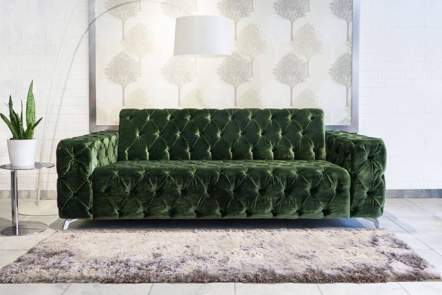 Zöld bársony tűzött kanapé