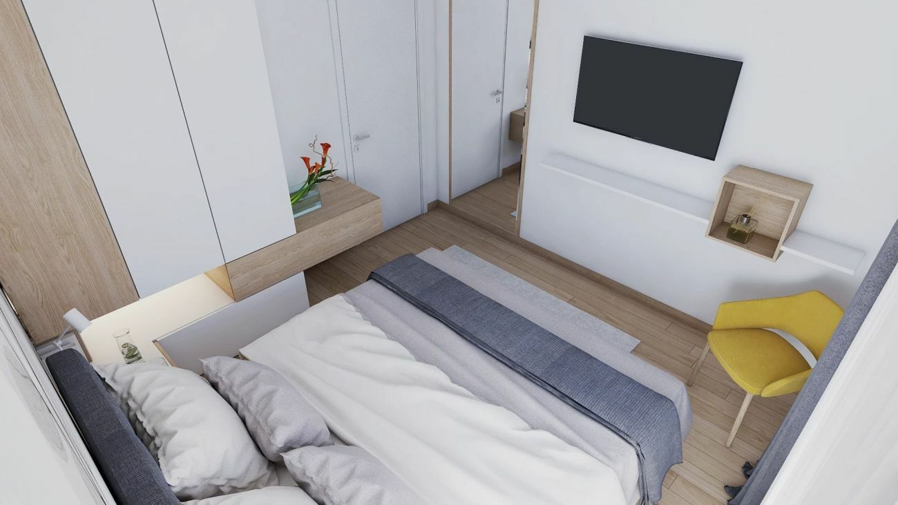 Egyszerű, de praktikus szekrények a hálóban és egy tévé