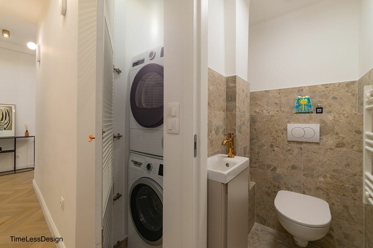 A mosógépnek és a szárítónak szánt külön helyiség