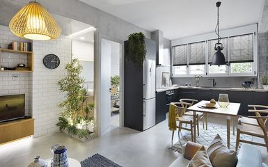 46 m2-es barcelonai lakás üvegfalú fürdővel és növénydekorációval